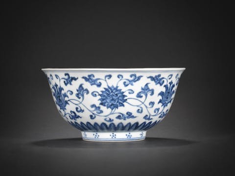 old chinese porcelain bowl from ming dynasty with blue and white lotus decoration
