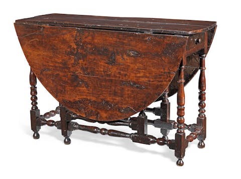 A solid yew-wood gateleg dining table, English, circa 1700