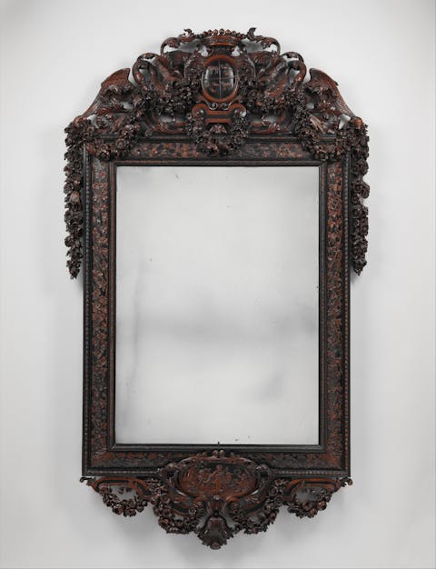 Antique mirror, circa 1685 –1700. (Public Domain)