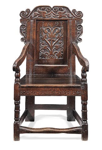 A William & Mary joined oak panel-back open armchair, Yorkshire, dated 1691