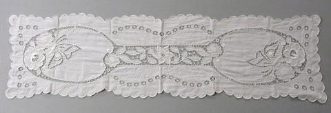 Table runner, white linen with cutwork and mountmellick embroidery.