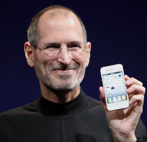 Steve Jobs shows off the iPhone 4 at the 2010 Worldwide Developers Conference, Matthew Yohe. (Public domain, cropped)