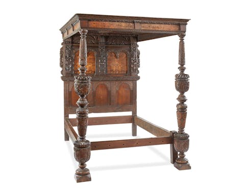 A rare and highly impressive Elizabeth I oak, walnut and marquetry inlaid tester bed,  Southwark, London, circa 1585