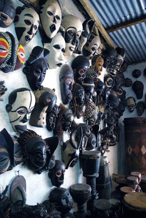 African masks for commercial sale, a display of African art in a shop