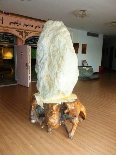 Large piece of nephrite jade in light milky green shade.
