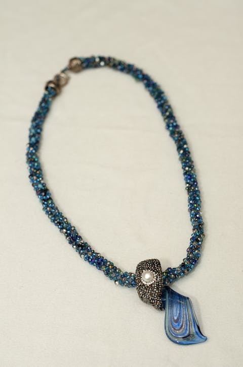 Necklace in blue crystals with druzy and Venetian glass