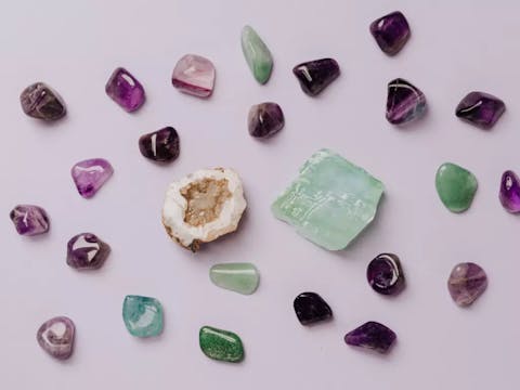 green, white, dark and purple jade stones