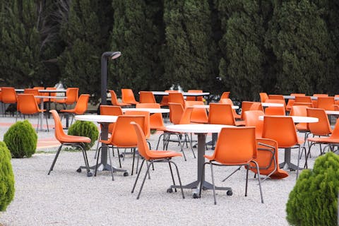 Polypropylene stacking chairs by designer Robin Day.