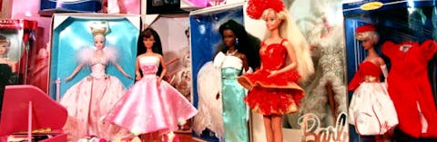 Collection of Barbie dolls.