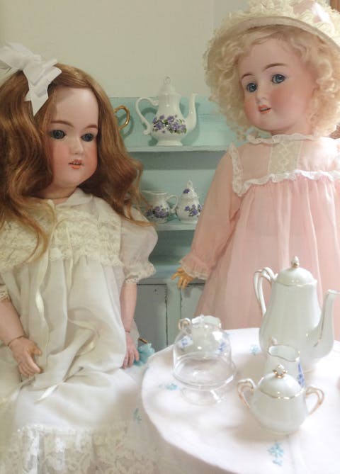 Two antique porcelain dolls
