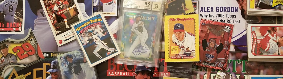 collection of assorted sports memorabilia cards