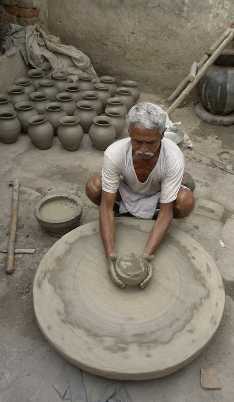 Pottery at work, Jaura, India. (Public Domain)