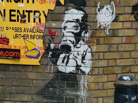 A photo of Banksy's street art in Brick Lane, East End, 2004, Matt Whitby. (Public Domain)