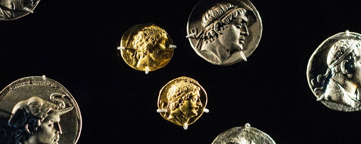 Antique gold and silver coins.