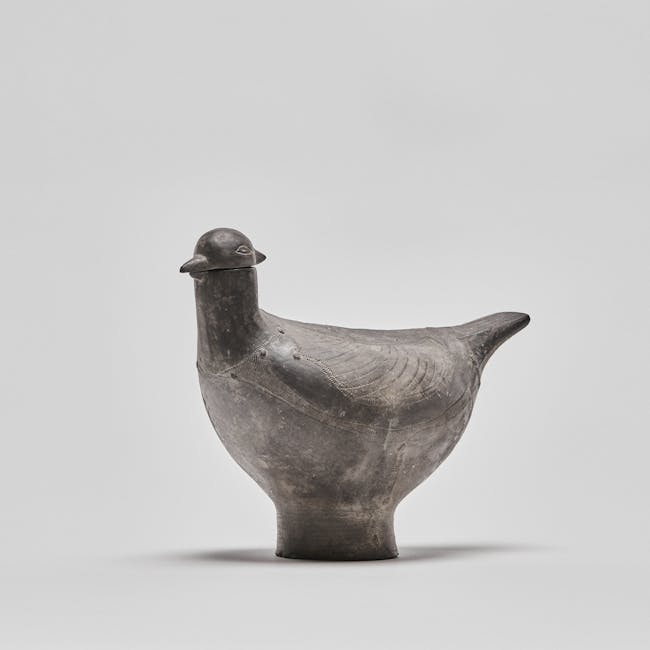 chinese pottery bird facing left
