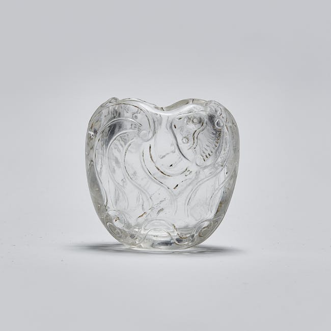 rock crystal water pot, lotus leaf form with animal faces