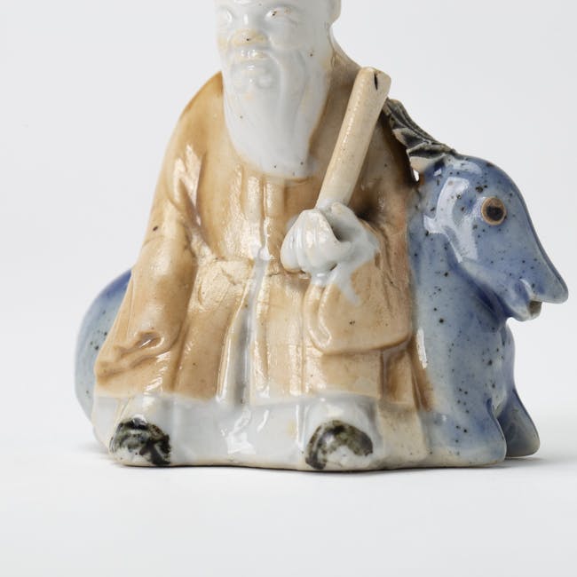 Chinese Enamel on Biscuit Waterdropper Figure of Shoulao God of Longevity with Deer detail robe feet