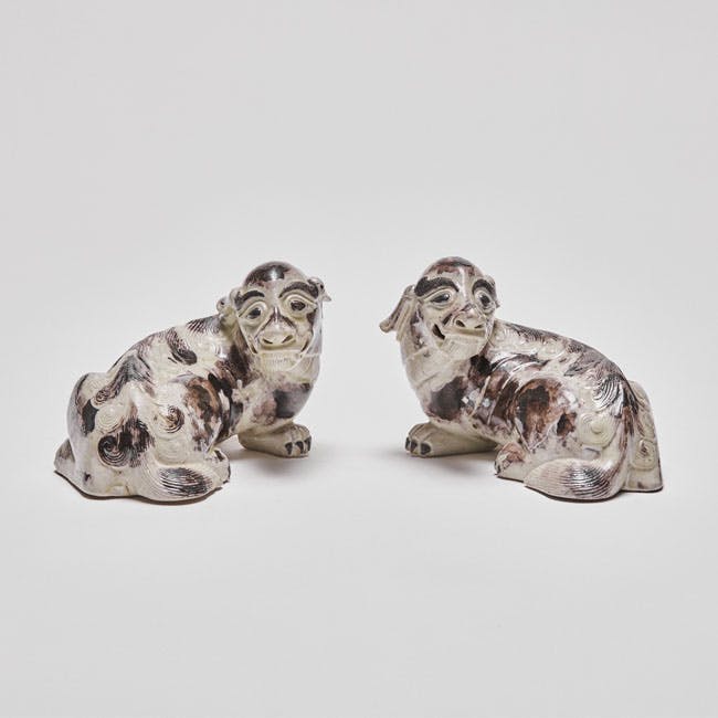 Chinese enamel on biscuit porcelain mythical dogs
