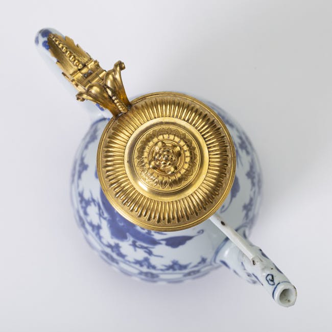 Chinese Blue and White Porcelain Ewer with Gilt Bronze Mount Cover, Transition period top cover