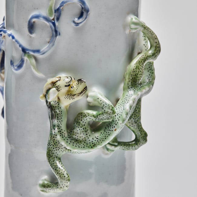 chinese porcelain arrow vase detail dragon green