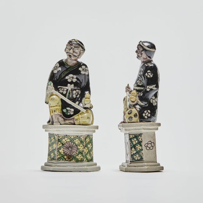 Chinese Famille Noire Porcelain Figures of Li Tieguai sideways