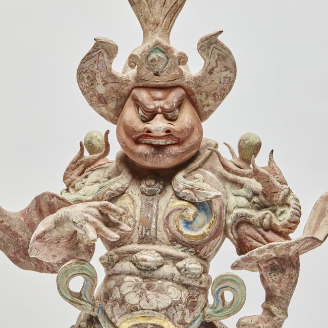 chinese pottery tomb guardian or Lokapala from the tang dynasty head torso detail