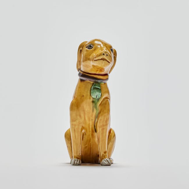 Chinese Enamel on Biscuit Porcelain Seated Dog front side