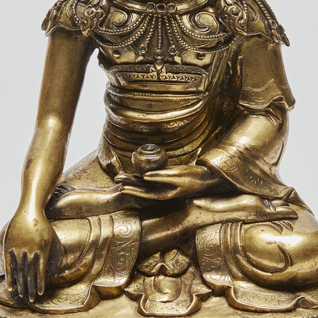 Sino-Tibetan gilt-bronze figure of Buddha Akshobhya vase detail 