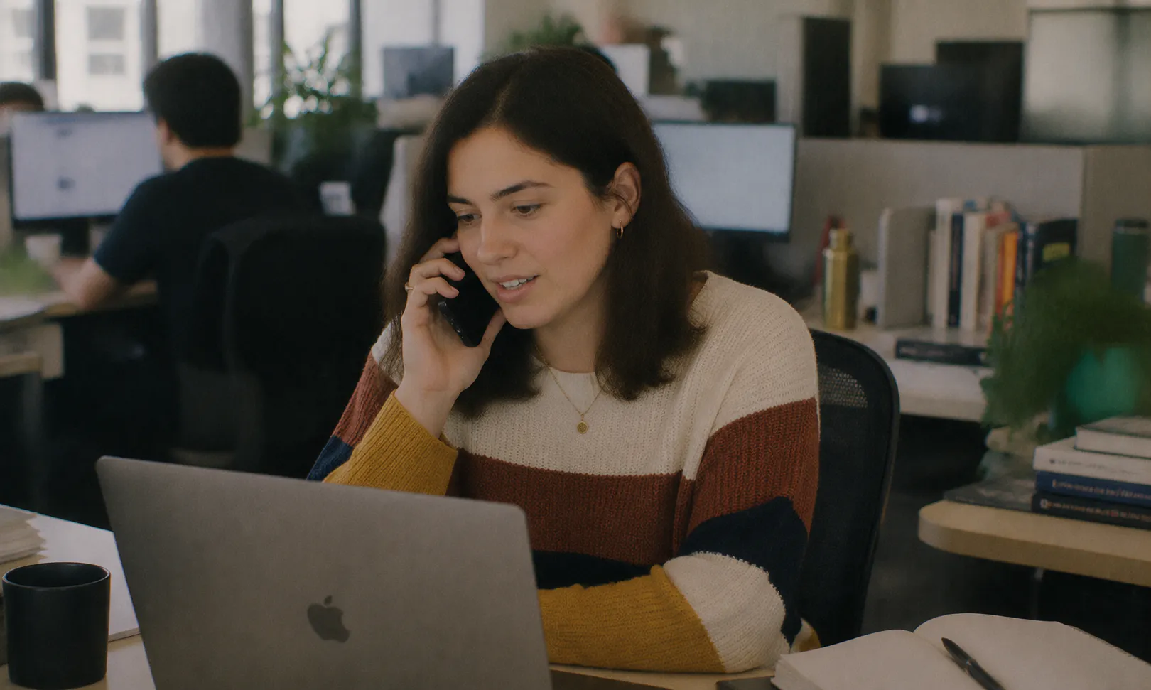 woman working in busy office