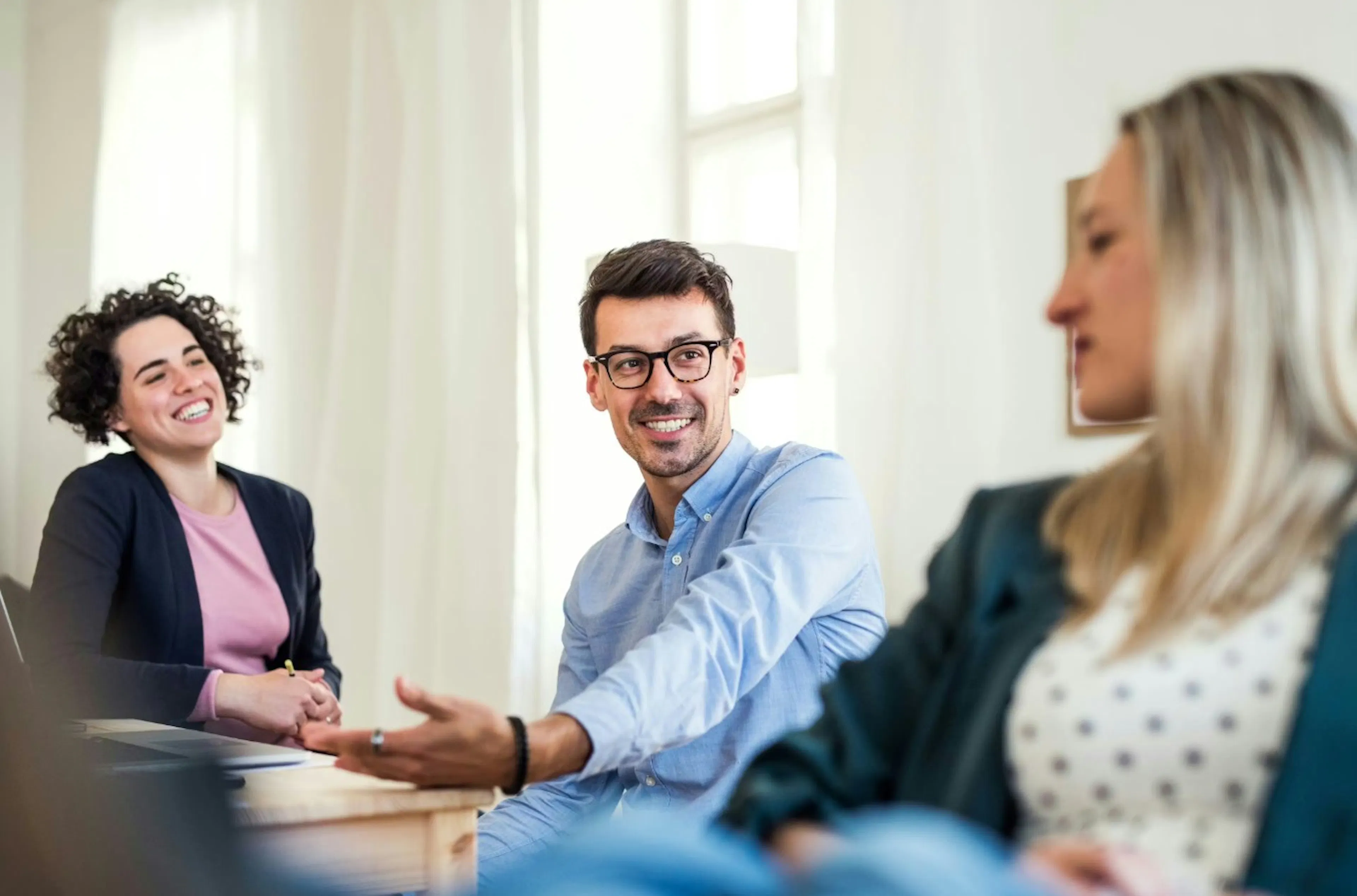 Business professionals discussing a high-value crypto transaction and investment strategy