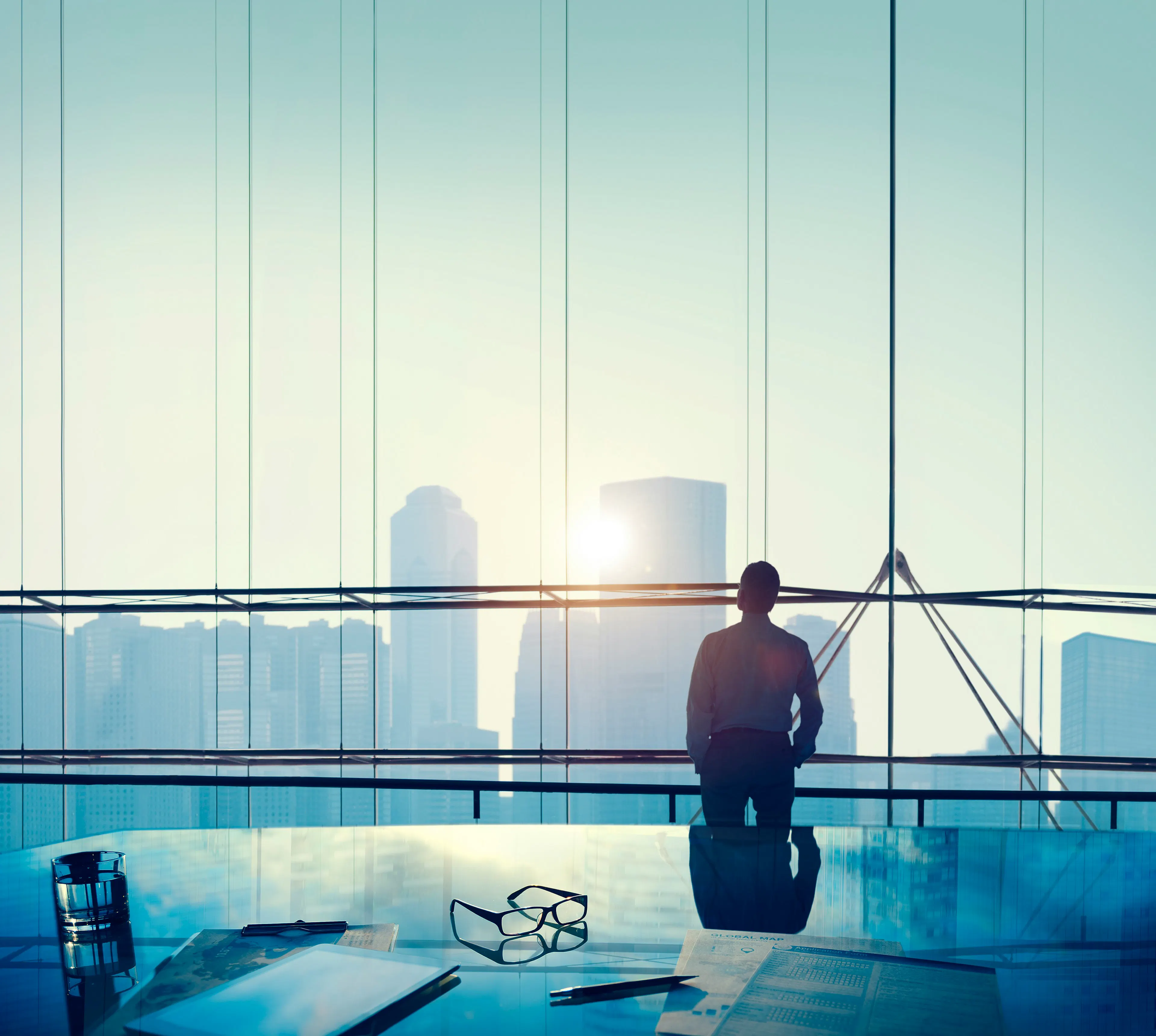 High-net-worth investor reviewing financial documents related to Bitcoin transactions in a modern office