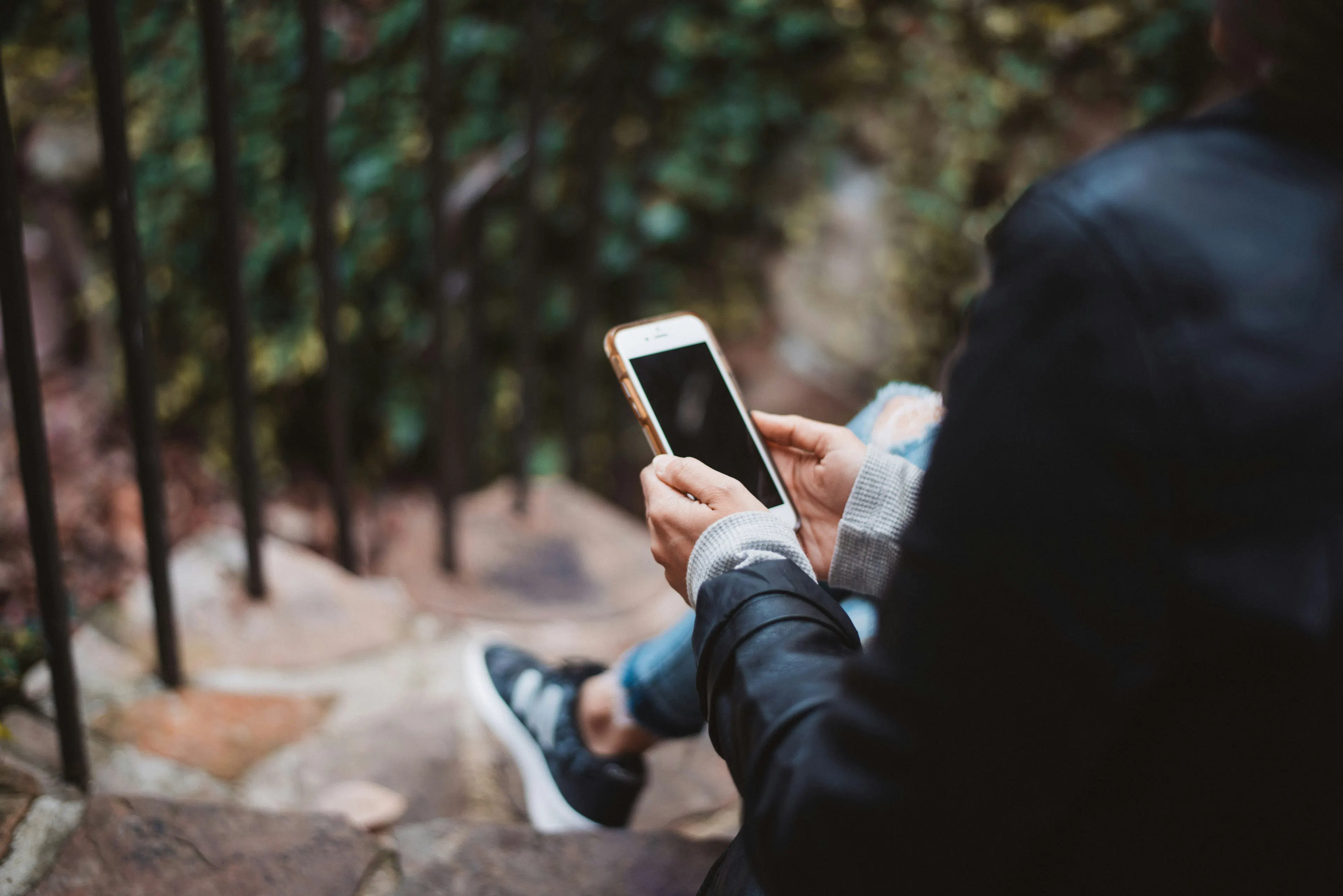Self-directed crypto buyer exploring a wide selection of coins in a mobile app, representing the hands-on, app-only user Newton suits best