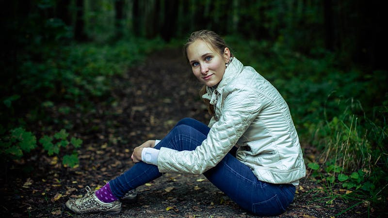 Liisi sat down in a forest.