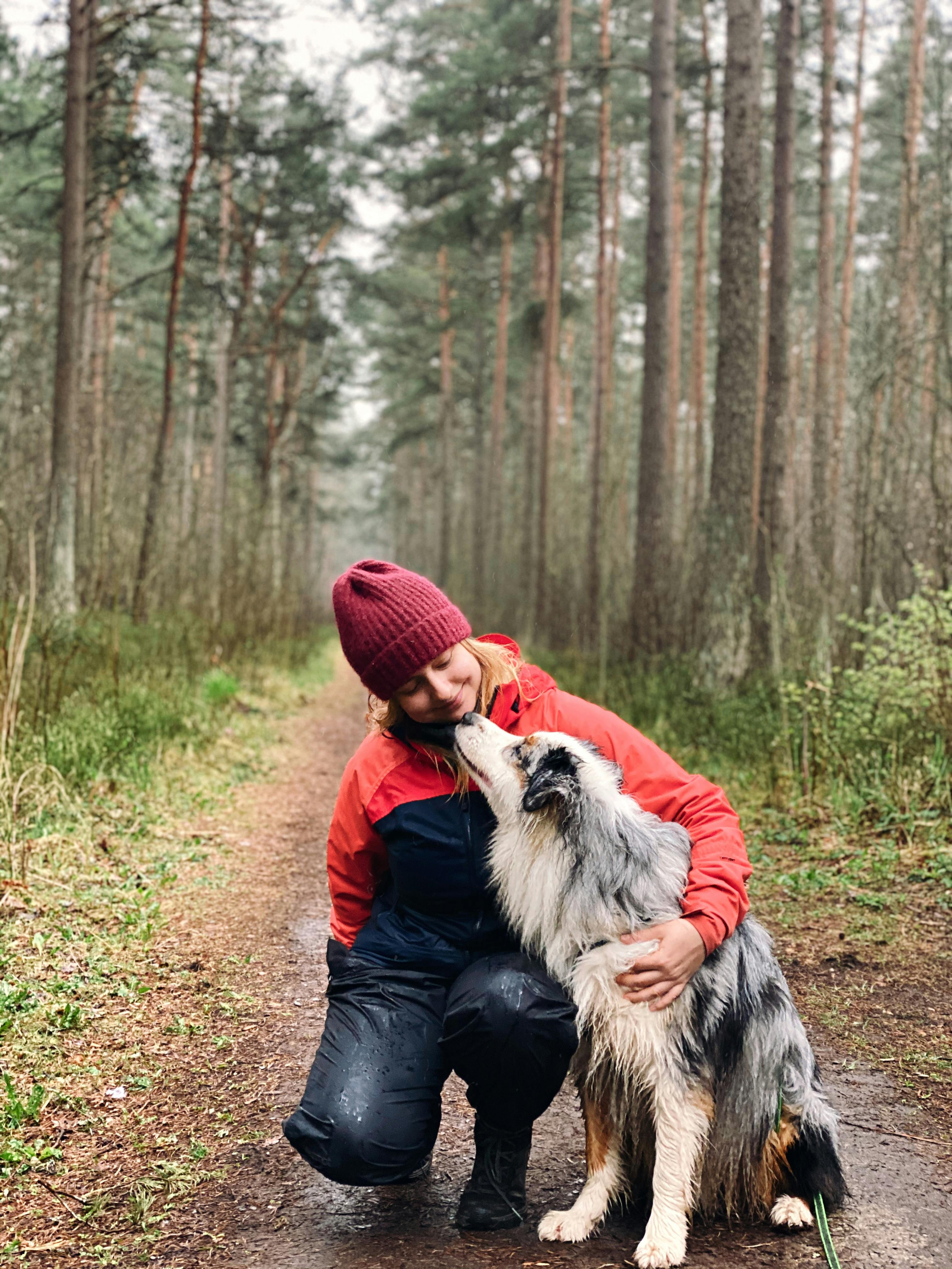 Kateryna in a forest with a dog