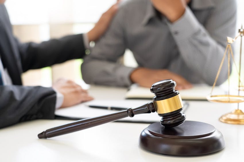 Judges Hammer Next To Two Lawyers
