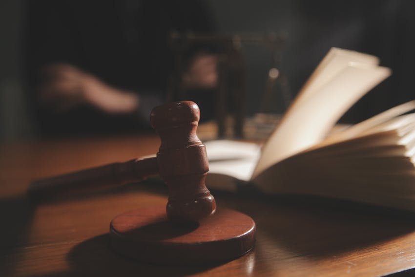 Photo of court attributes and a book on the table