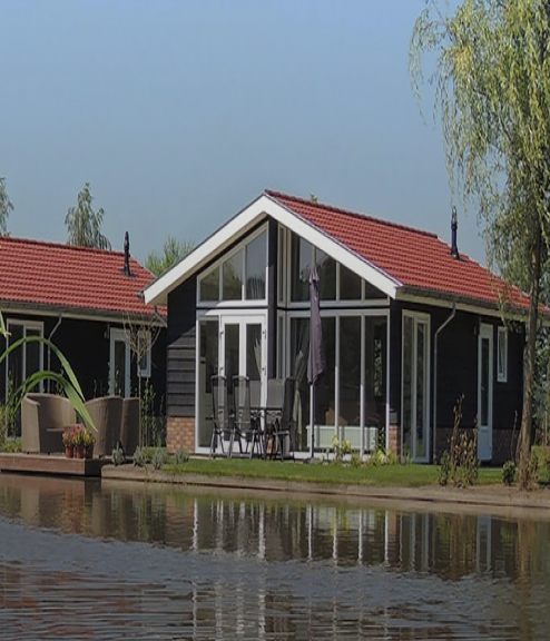 vakantiehuis met houten gevel en dakpannen verzekeren