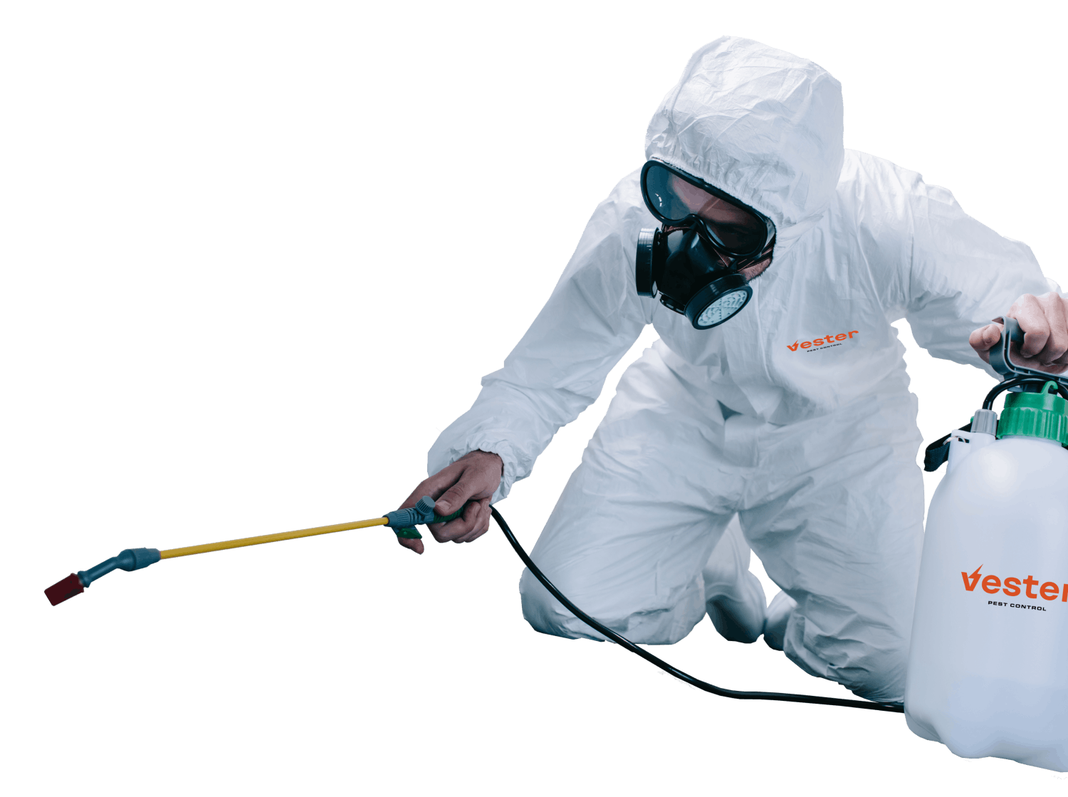 pest control specialist preparing to spray