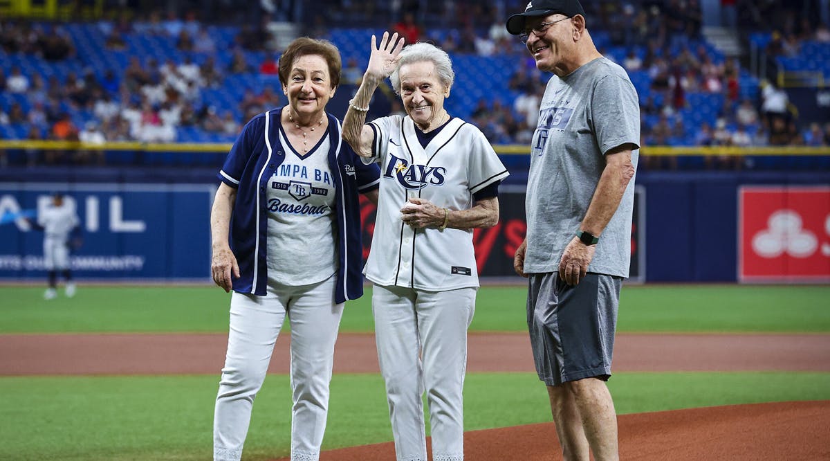 Helen Kahan, center, with her daughter Livia Wein and son Lucian Kahan, at the Yankees-Rays game in Tampa Bay