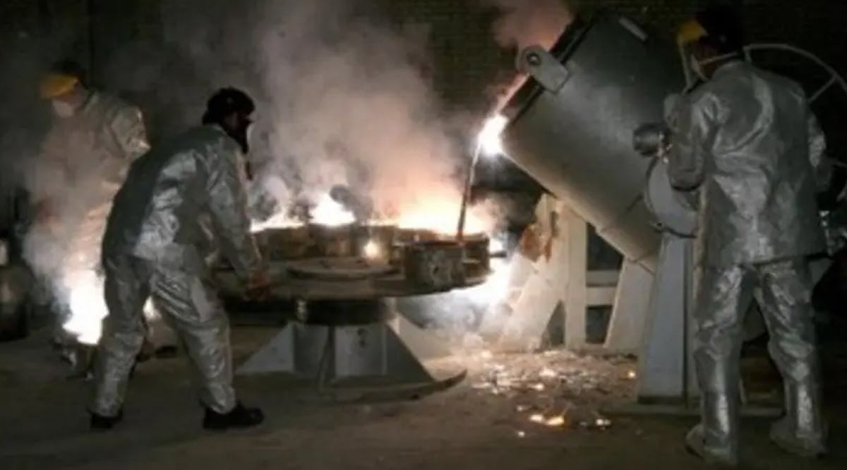 Iranian technicians work at a uranium processing site in Isfahan