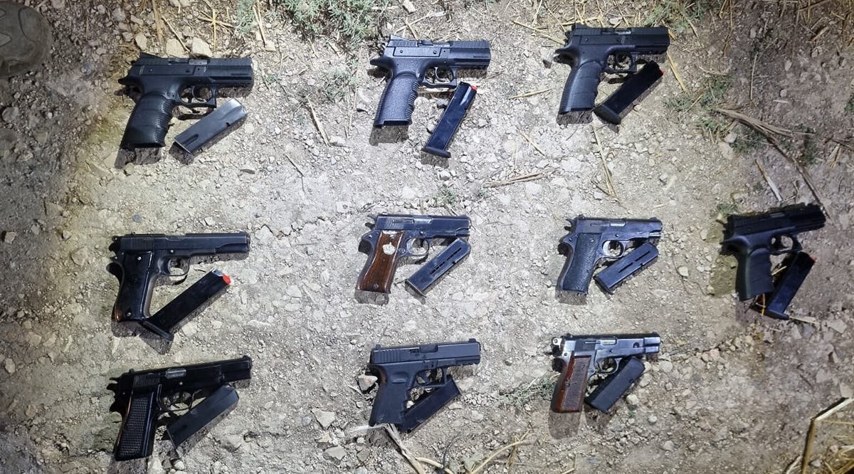 Weapons seized by security forces near Neve Ur in northern Israel, after an alleged gun-smuggling over the border