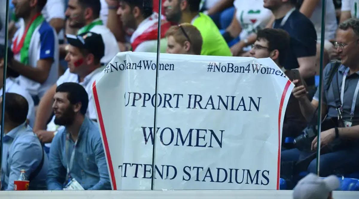 Banner displayed referencing Iranian women during the match