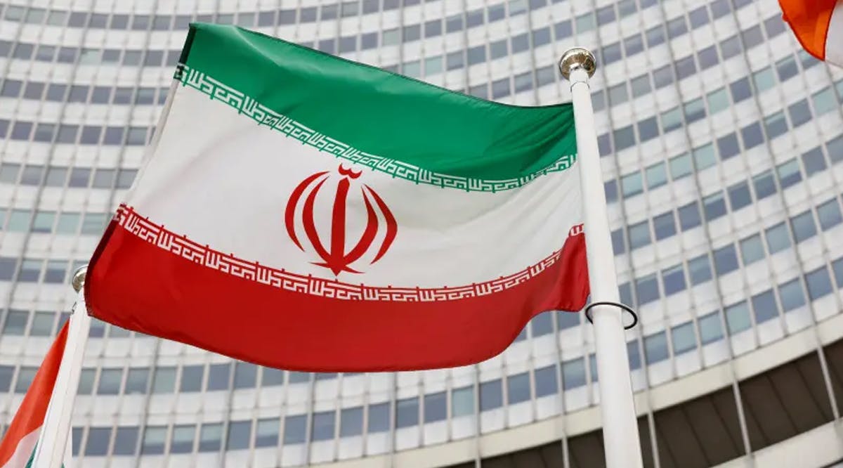 The Iranian flag waves in front of the International Atomic Energy Agency (IAEA) headquarters