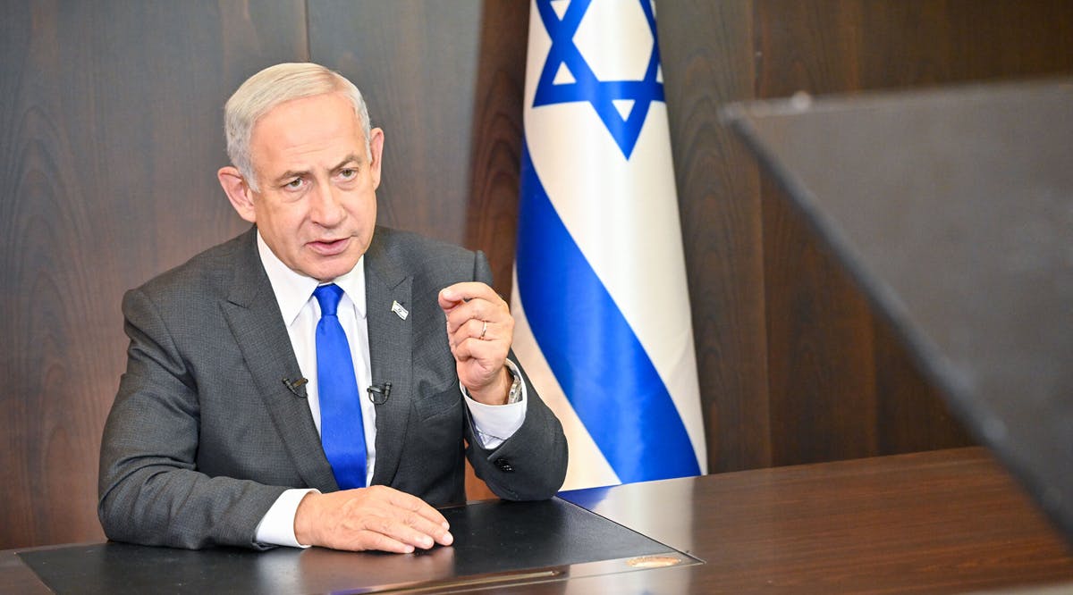 Prime Minister Benjamin Netanyahu holds a video conversation with members of AIPAC from his office in Jerusalem
