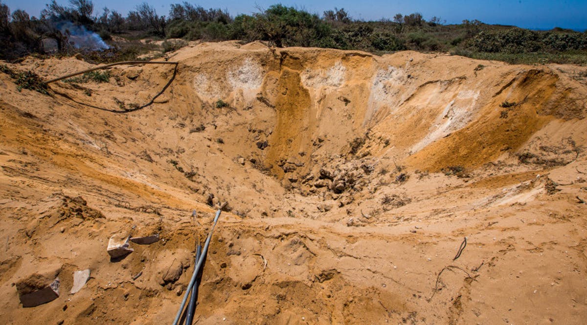 The damage caused by an explosion from an unknown source, in the field of an abandoned factory in Herzliya