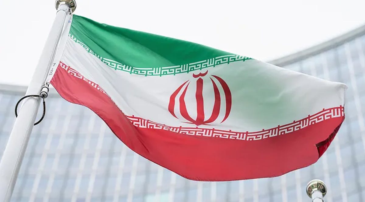 The flag of Iran waves in front of the International Center building at the headquarters of the International Atomic Energy Agency in Vienna
