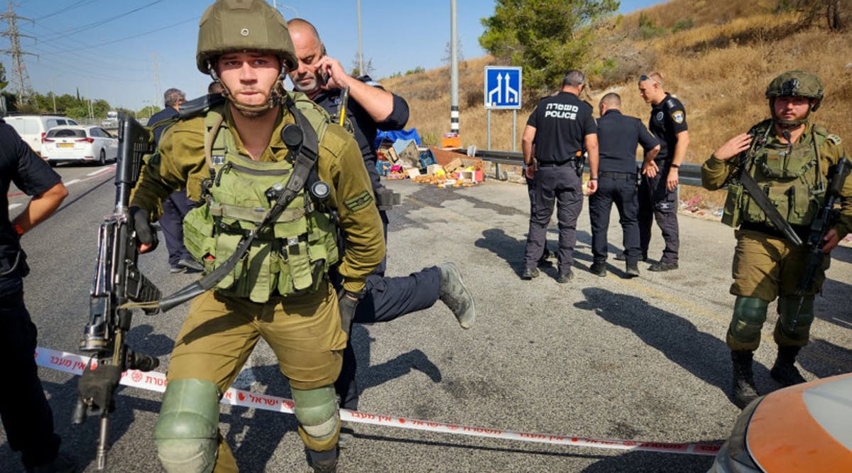 Police at the scene of a car ramming terror attack near Maccabim