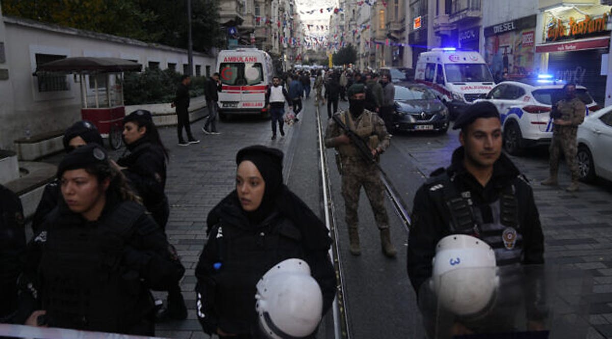 Security and ambulances at the scene after an explosion on Istanbul's popular pedestrian Istiklal Avenue