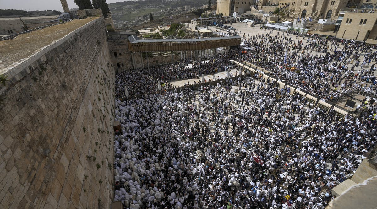 Jewish worshipers participate in prayers for Passover at the Western Wall in Jerusalem's Old City
