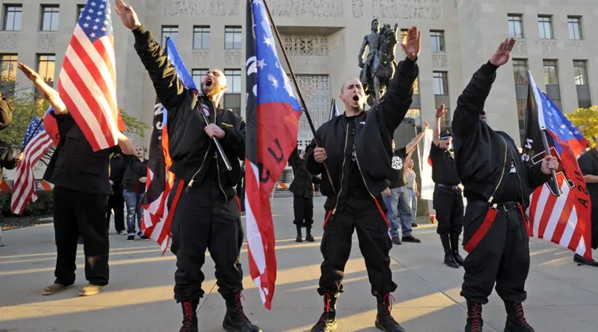 A Nazi's salute at a neo-Nazi rally
